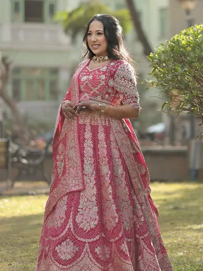 A full-length shot of Dhwani's beautiful baby shower outfit. She looks like a queen, ready to welcome her little one.