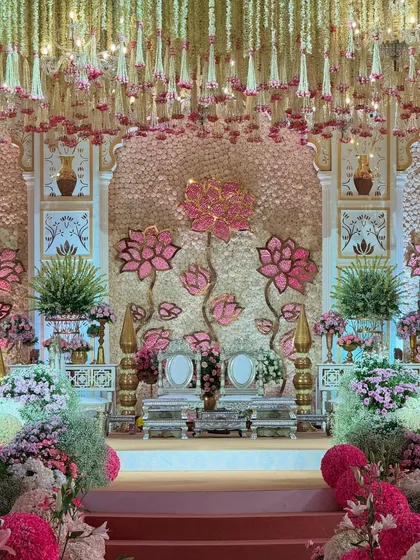 Various angles of the pastel mandap, showcasing the expanse of blooms, the custom seating, the floral aisle, and the intricate details that made this a truly wholesome and majestic celebration.