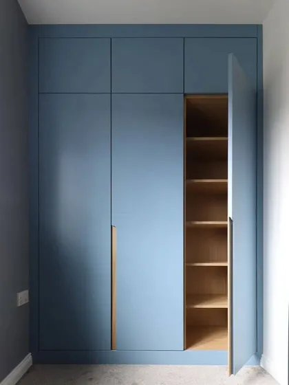 A view with the other door open, showcasing the adjustable shelving for folded clothes and other items.