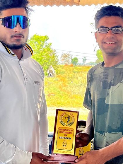 Rahul Vijayran, awarded Best Bowler of the tournament, with his trophy.