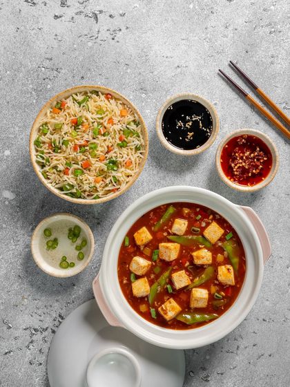 A top-down view of the Mapo Tofu and fried rice set meal for Novotel.