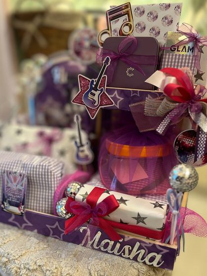 Another angle of the popstar hamper, showcasing the personalized name and the multi-level arrangement of gifts.