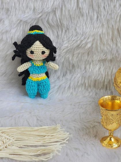 Princess Jasmine from Aladdin. I loved creating her iconic blue outfit and hairstyle. She is ready for a magic carpet ride and makes a wonderful addition to the Disney princess collection.
