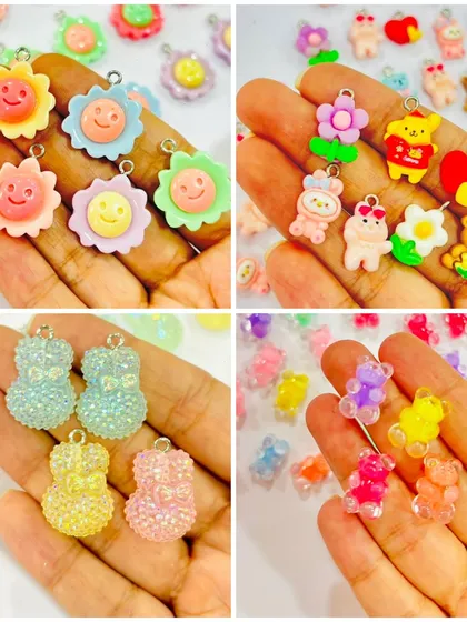 We offer a variety of charms for your resin projects, including smiley flowers, cute animals, and glittery teddy bears. These are perfect for making custom keychains and jewelry.