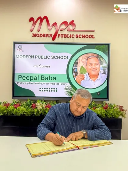 Signing the visitor's book at Modern Public School after an engaging session. It's an honor to connect with schools that are committed to environmental responsibility.