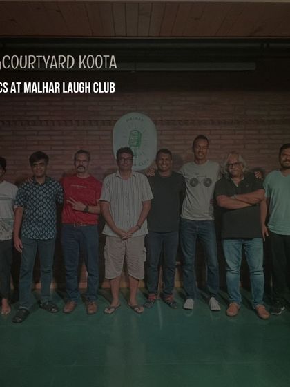 A group photo from a 'Mics at Malhar Laugh Club' open mic night. We are a nurturing ground for new talent, with many first-timers taking the stage.