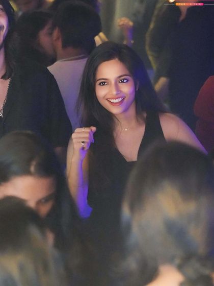 A guest smiling and dancing. My goal is to create a night filled with happy moments like this.