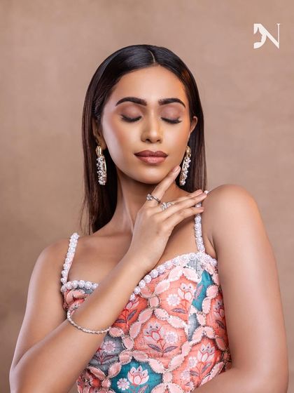 A close-up of the soft, natural-looking makeup. The skin glows, and the features are gently defined.