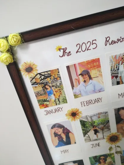 A close-up of the '2025 Rewind' calendar frame, showing the detailed sunflower and floral embellishments.