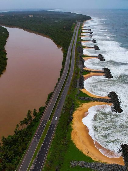 The unique landscape of Maravanthe, with the brown river on one side and the blue sea on the other.
