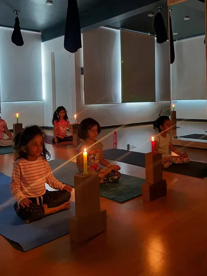 A moment of calm and focus during our Trataka or candle gazing meditation. This ancient practice helps children improve concentration, calm their minds, and even get better sleep.