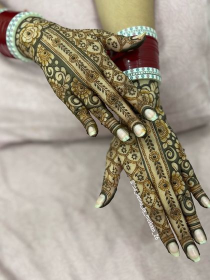 The back-of-hand design to match the shaded roses, with a beautiful floral vine pattern.