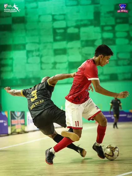 A player dribbling past a defender with ease.