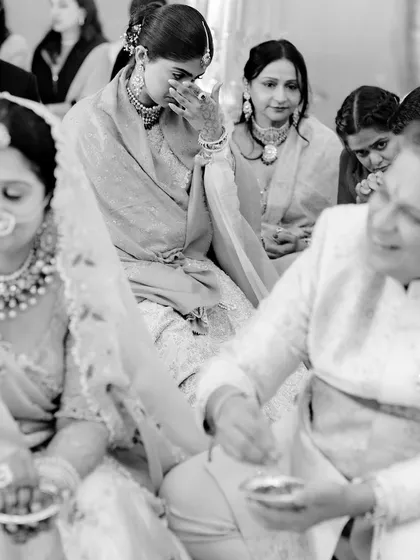 The unscripted tears are just as important as the joyful smiles. I focus on these photojournalistic moments that reveal the deep emotional currents of the day, capturing the sincere love of family that surrounds you.