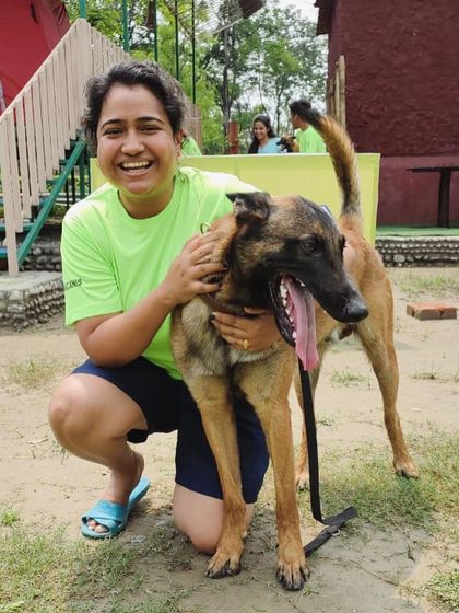 This is me with a Belgian Malinois, one of the highest-drive breeds out there. My advanced certification allows me to work with complex behaviors and working-line dogs, using their intelligence and energy for positive outcomes.