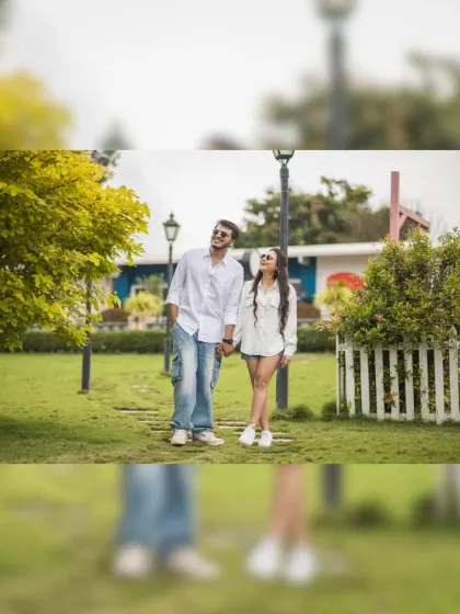 A happy stroll through a park. The couple's relaxed posture and smiles make this a perfect example of a casual and natural pre-wedding shoot.