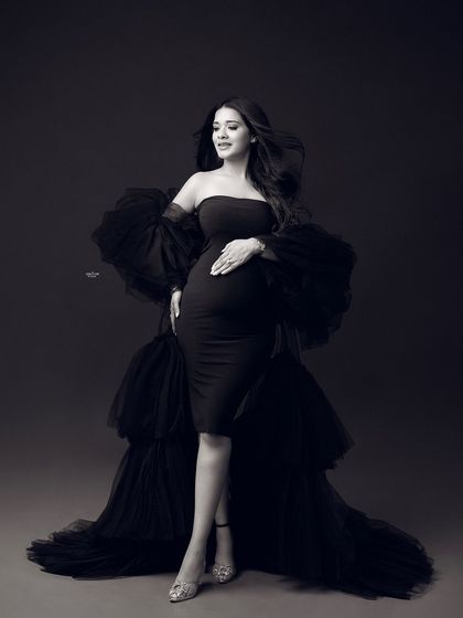 This B&W image from a workshop shows how removing color can emphasize emotion and movement. The flowing hair and joyful expression become the main focus.