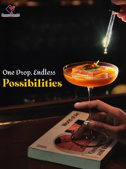 One drop, endless possibilities. A bartender adds a final, transformative drop of bitters to a cocktail, showcasing how small details can have a huge impact on the final flavor.