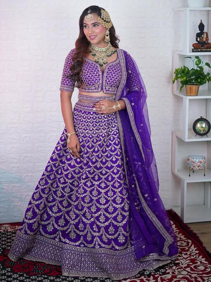 A full view of our purple and silver embroidered lehenga. The A-line cut and heavy work make it a grand outfit for any celebration.