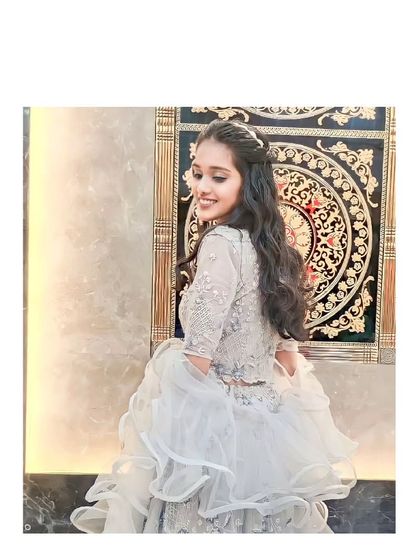 A beautiful twirl in our grey ruffle lehenga. This outfit is designed for movement and looks incredible on the dance floor.