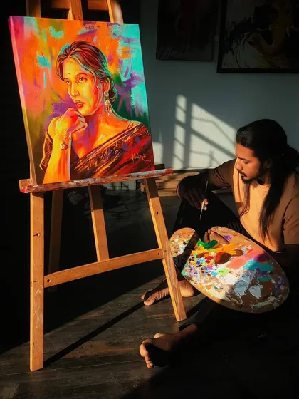 In my studio, I find the perfect light to bring my colorful portraits to life, using a palette of rich acrylics to capture every detail.