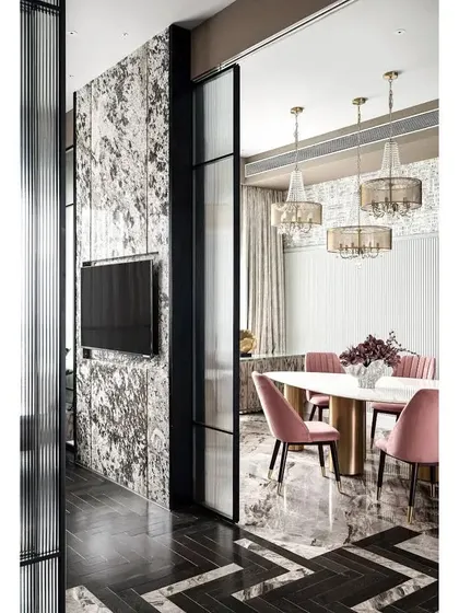 A view from the den into the dining area, framed by tall, fluted glass sliding doors. This demonstrates how I use architectural elements to create separation and privacy without sacrificing light or a sense of spaciousness.
