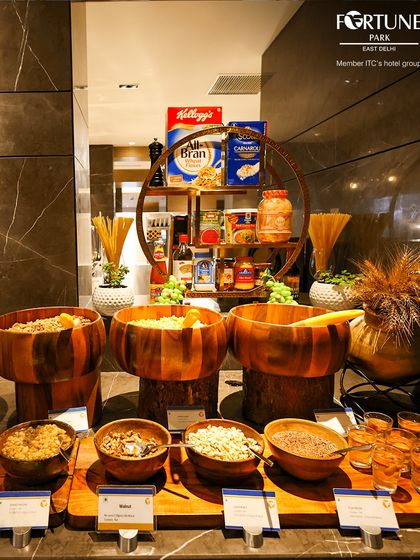 Our healthy breakfast corner includes a variety of cereals, muesli, and nuts for a wholesome start to the day.