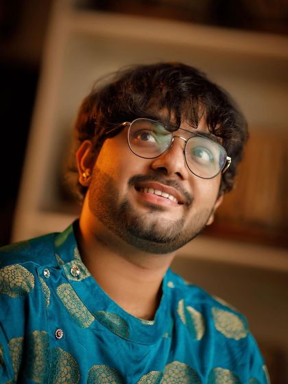 A close up portrait. The journey of an artist is filled with moments of reflection and inspiration.