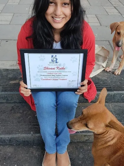 Sharing my achievement with the dogs who inspire it all. Becoming a certified trainer was a dream come true.