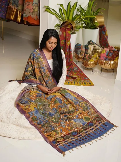 This is a glimpse into my Kalamkari Edition, featuring a wide array of hand-painted dupattas and fabrics from the Indralokam series. Each piece is a unique story, available for you to customize into your dream outfit.