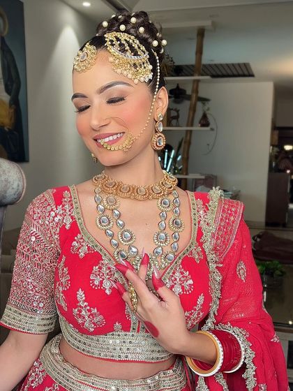 An extensive series of our classic red bridal lehenga. These images capture every detail, from the embroidery to the full bridal styling, providing a complete reference.