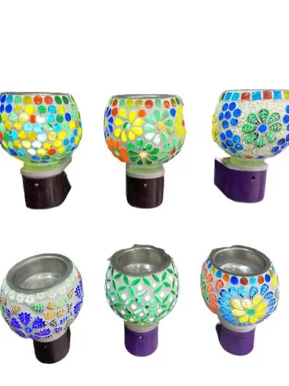 Explore our vibrant collection of plug-in mosaic aroma lamps. Each one has a unique, handcrafted design and color combination, serving as both a beautiful night light and a fragrance diffuser for any room in your home.