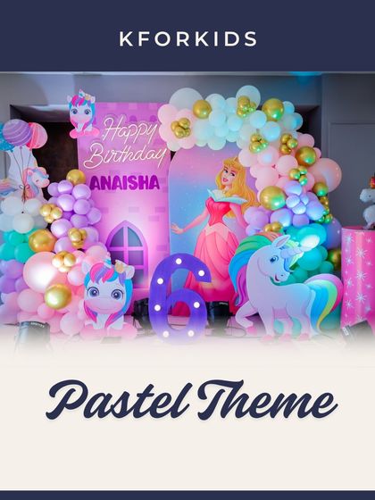 A magical Pastel Princess theme featuring a beautiful castle, a rainbow-maned unicorn, and a light-up number '6'. The soft pastel balloon arrangements add a dreamy touch to this enchanting setup.