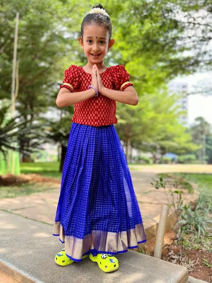 A respectful "Vanakkam" from one of our youngest students. We teach not just the steps, but the culture and grace that go with traditional dance forms.