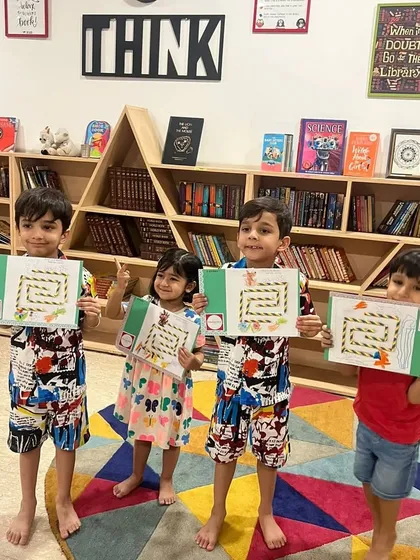 That feeling of accomplishment is what it's all about. Here, our summer campers proudly show off the maze games they created themselves after a fun session on physics.