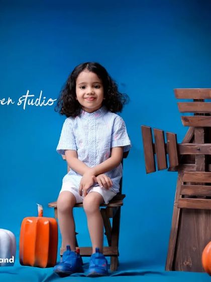Grow strong and healthy. A simple and classic studio portrait with a rich blue background and rustic props.
