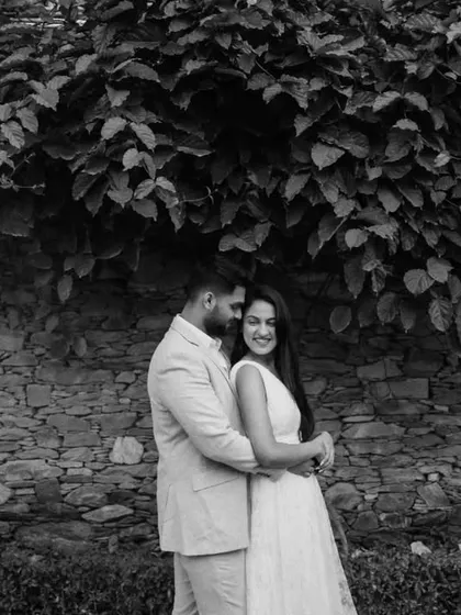 A timeless black and white portrait. This classic style emphasizes the emotion and connection between the couple, creating a photograph they will treasure forever.