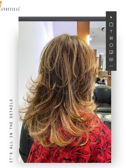 The back view of this layered cut shows off the texture and movement. The highlights enhance the layers, creating a dynamic and voluminous style.