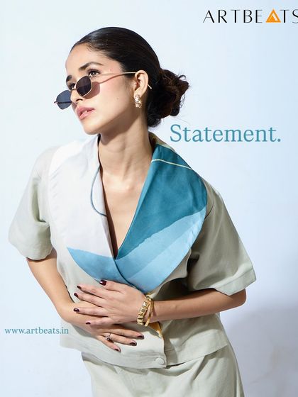 A statement collar from the Kintsugi silk scarf top. This piece is a conversation starter, hand-detailed and art-infused to stand out.