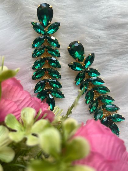 These Korean-style earrings with green crystal stones were super lightweight and perfect for parties. They sold out so fast.