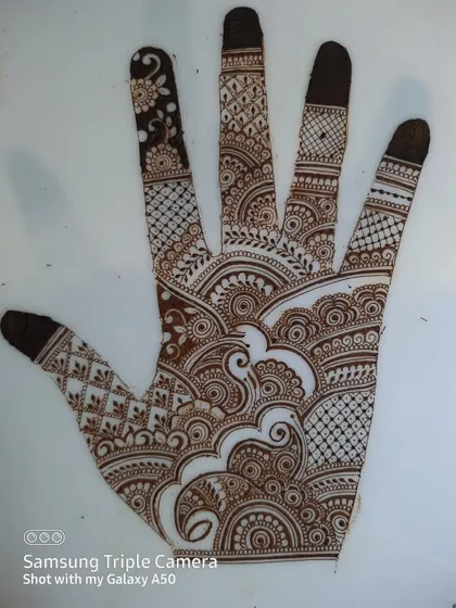 Some of my practice sheets where I experiment with different layouts and motifs. This helps me come up with new ideas for both bridal and party henna designs.