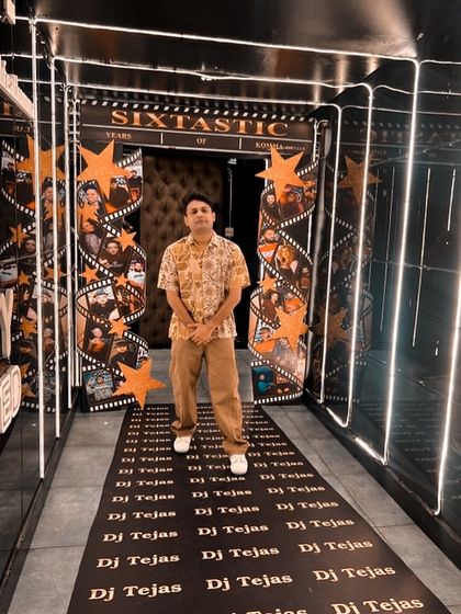 Posing at the entrance of a club in Hyderabad, ready for the show.