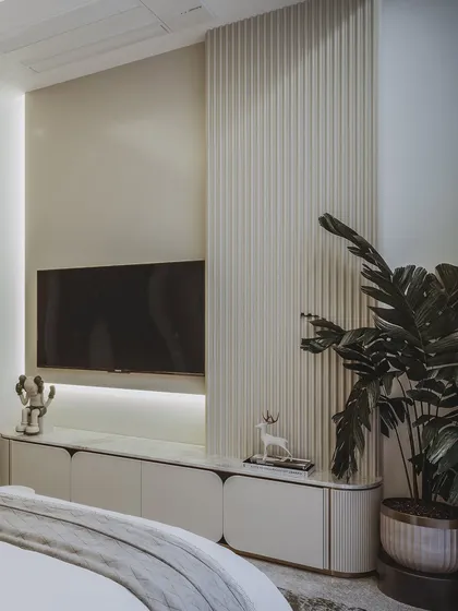 The TV wall is rendered with subtle fluted details and a floating console, maintaining the room's clean and uncluttered aesthetic.
