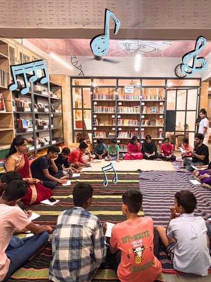 In the beautiful setting of the Kitabein Bolti Hain library, children gather on the floor for a music session. We adapt our programs to any space, turning libraries, community halls, and classrooms into hubs of creativity.
