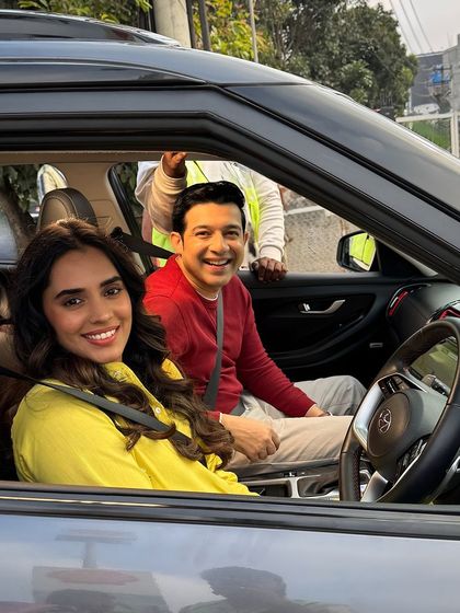 On set for a car scene, playing a husband and father. This behind-the-scenes shot shows the setup for capturing in-vehicle conversations.