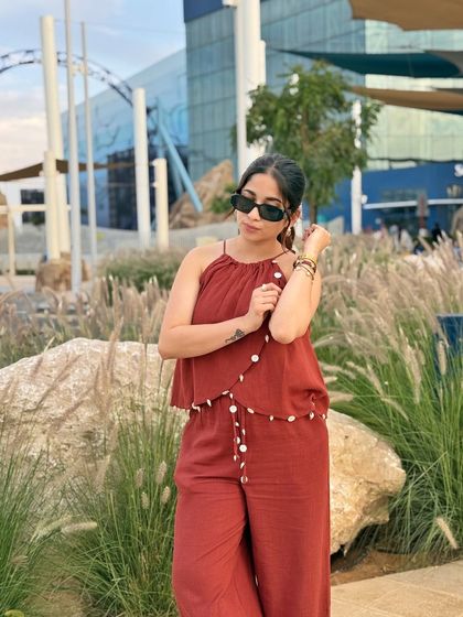 Another look at my linen co-ord set. The shell details add a lovely, beachy touch, making it a perfect vacation piece.