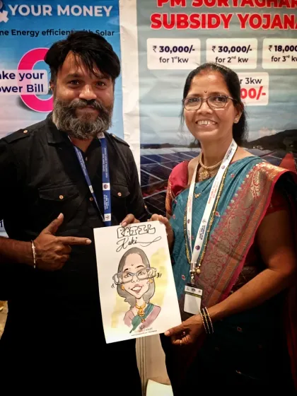 Here I am with the founder of the Shark Tank funded brand 'Patil Kaki', after drawing her live caricature at an event.