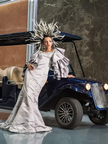 Juxtaposing a high-fashion look with an industrial vehicle for a commercial shoot. This kind of creative thinking helps brands create unique and memorable campaign images.