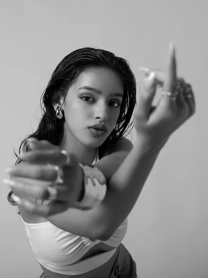 Another expressive black and white portrait. This image captures a moment of attitude and confidence, key elements in many of the dance styles I teach.