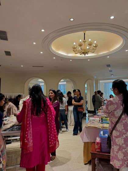 The elegant architecture and lighting of the indoor venue add a touch of class, making the entire shopping experience feel premium.